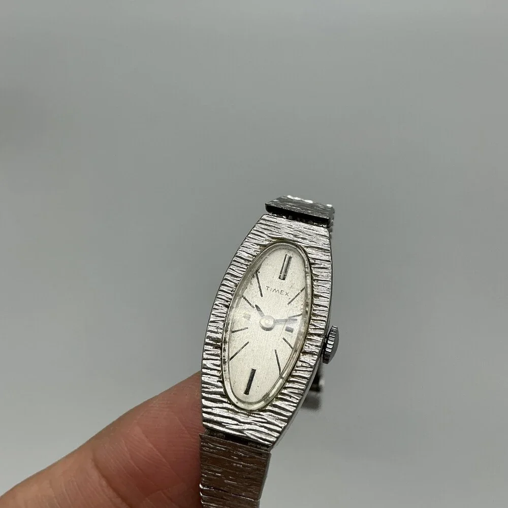 Vintage Timex Womens Watch 14mm Oval Dial Silver Tone Adj Band Manual Wind